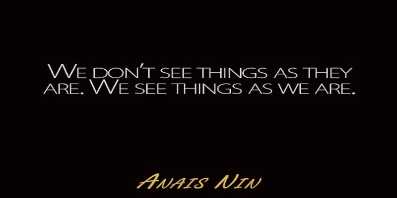 Image of the quote, “we don't see things as they are. We see things as we are”, written in white letters on a black background.