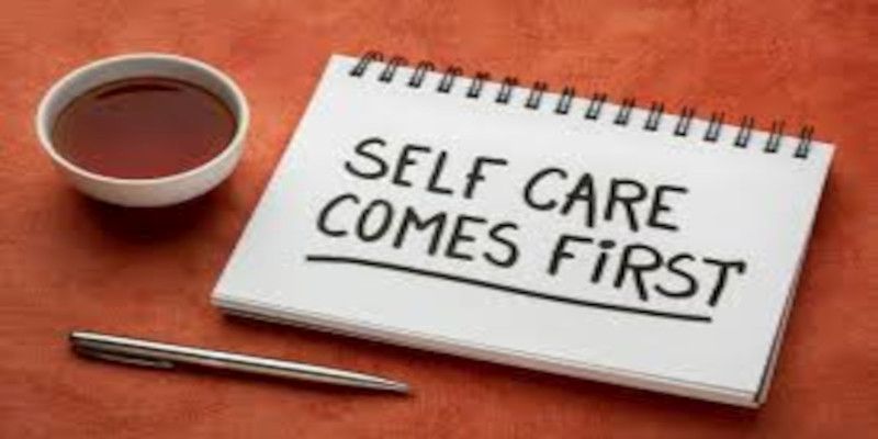 Picture showing the text “Self care comes first” written down in a notebook.