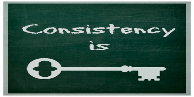 Words written are, “consistency is” with a key displayed afterwards.