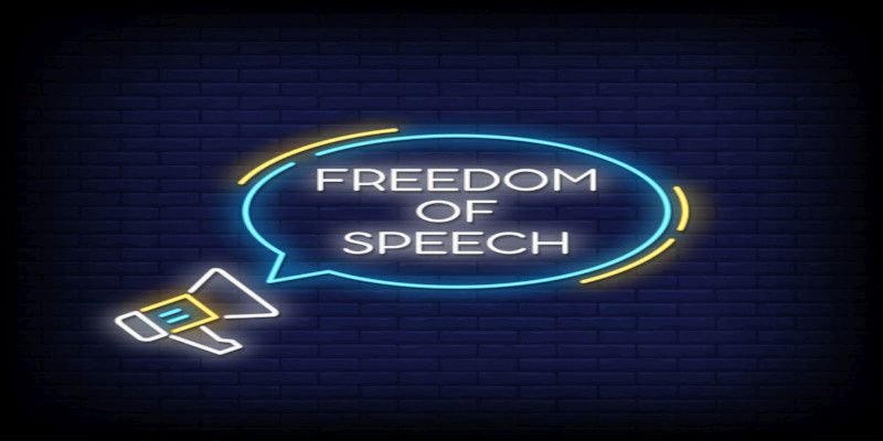 Picture of a microphone and a text bubble with the words “freedom of speech” in it.