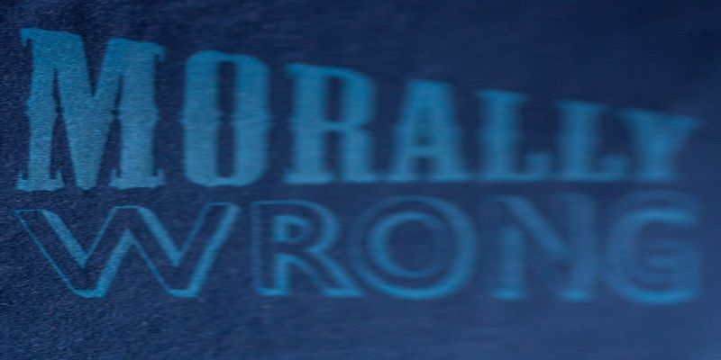 Image of the words “morally wrong” written on a blue background.
