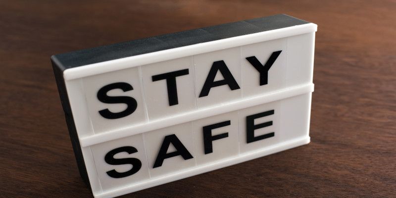 Small Stay Safe sign on a table or floor.