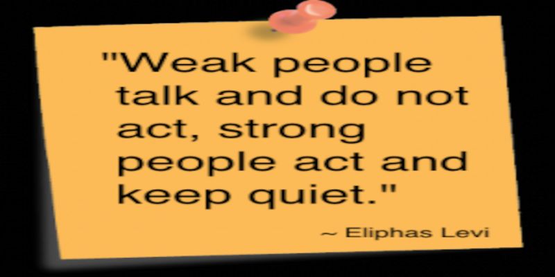 The quote, “weak people talk and do not act, strong people act and keep quiet” written in black letters on an orange note.