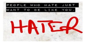 The quote, “haters who hate just want to be like you.” written on a white background.