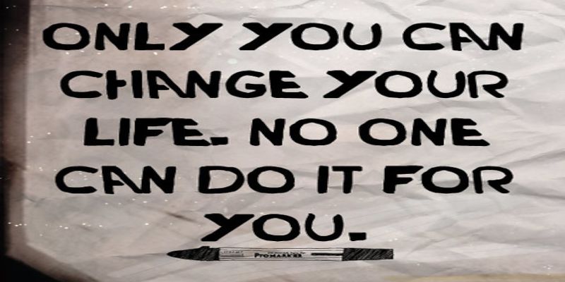 The quote, “only you can change your life. No one can do it for you” written in black letters.