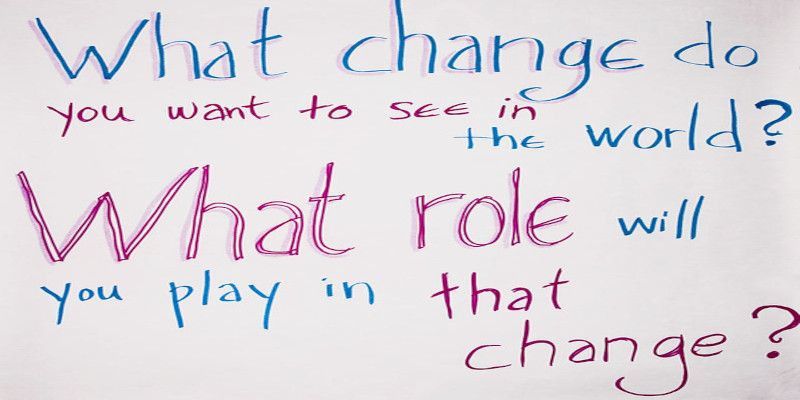 The quote, “what change do you want to see in the world? What role will you play in that change?” written on a white background.