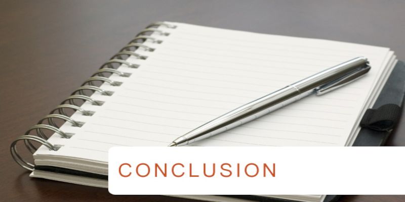 Image of a notepad with a pen lying on top of it with the word “conclusion” written in front of it.